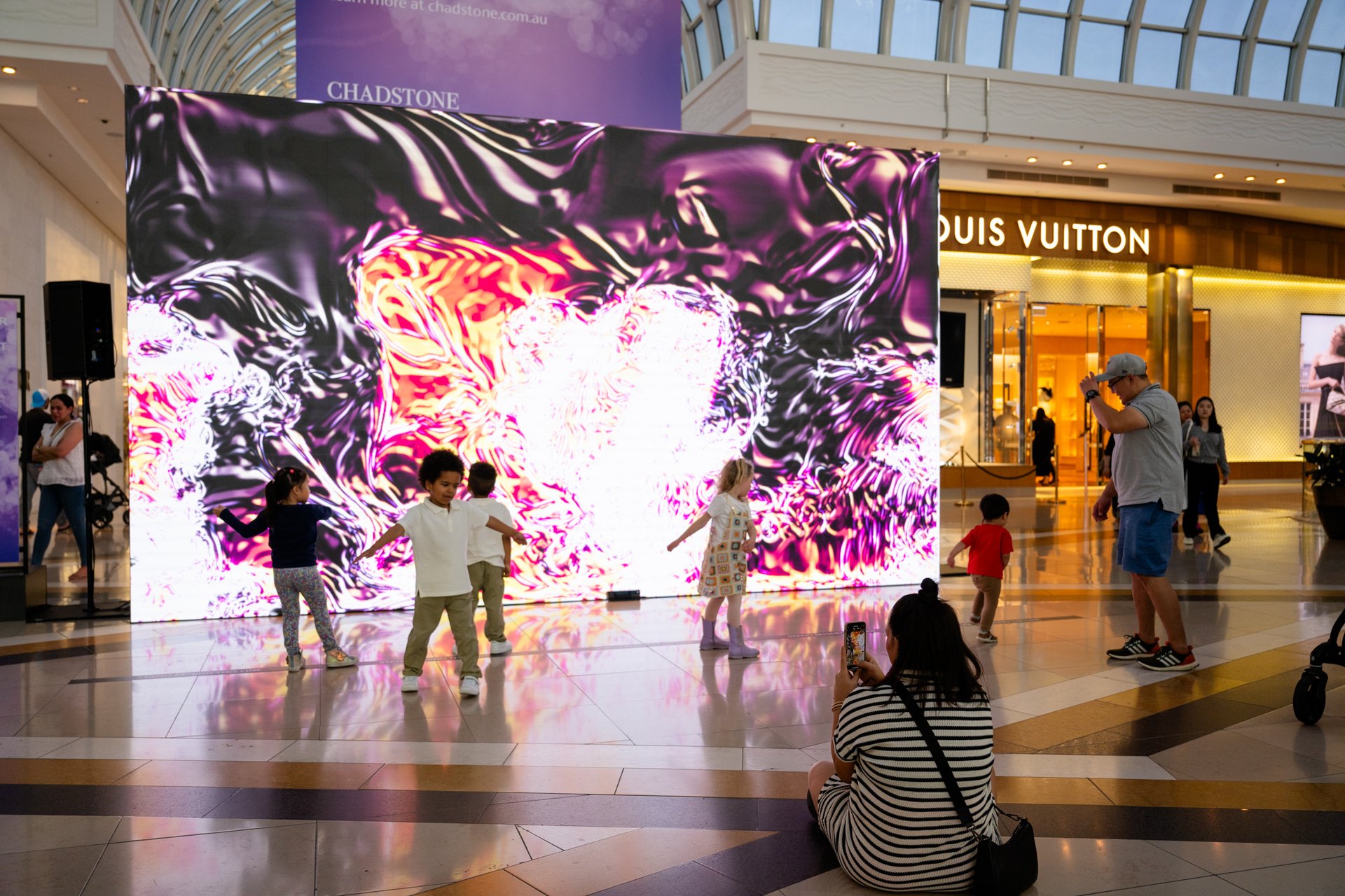 A hired LED wall driving a shopping-centre brand activation
