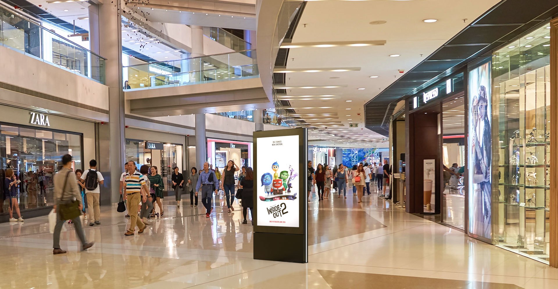 An indoor digital kiosk in a retail concourse