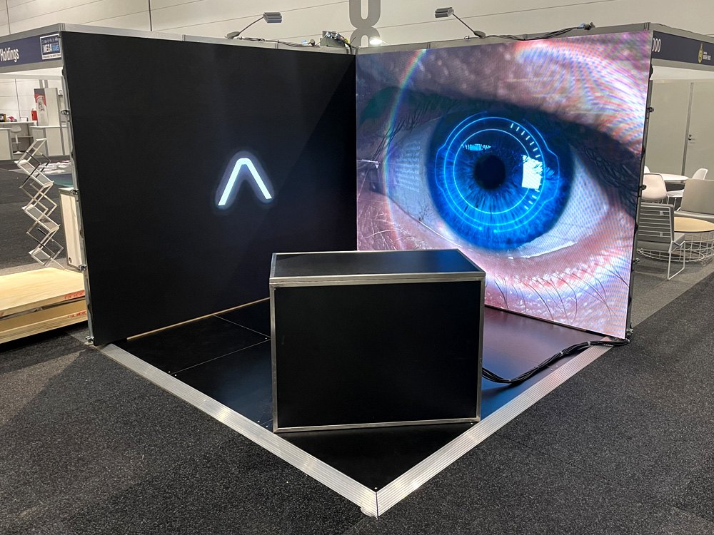 A hired LED video wall drawing visitors to an exhibition stand