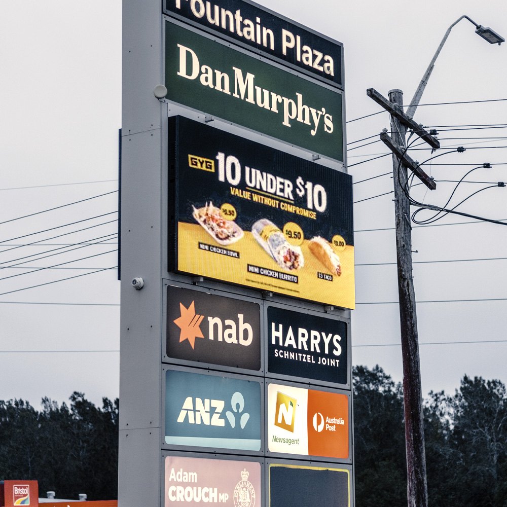A converted pylon sign carrying a full-colour LED panel