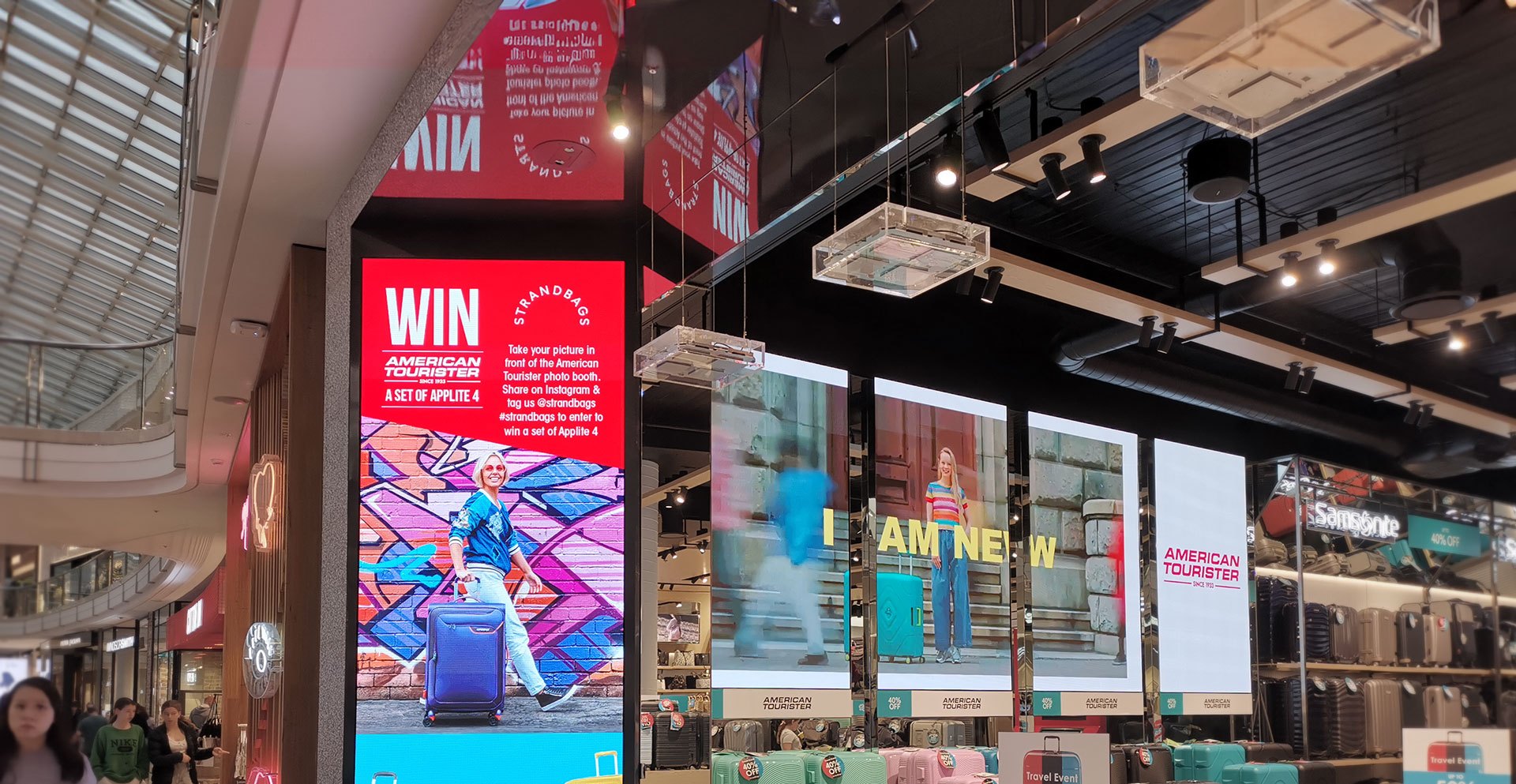 An LED video wall wrapping a retail interior