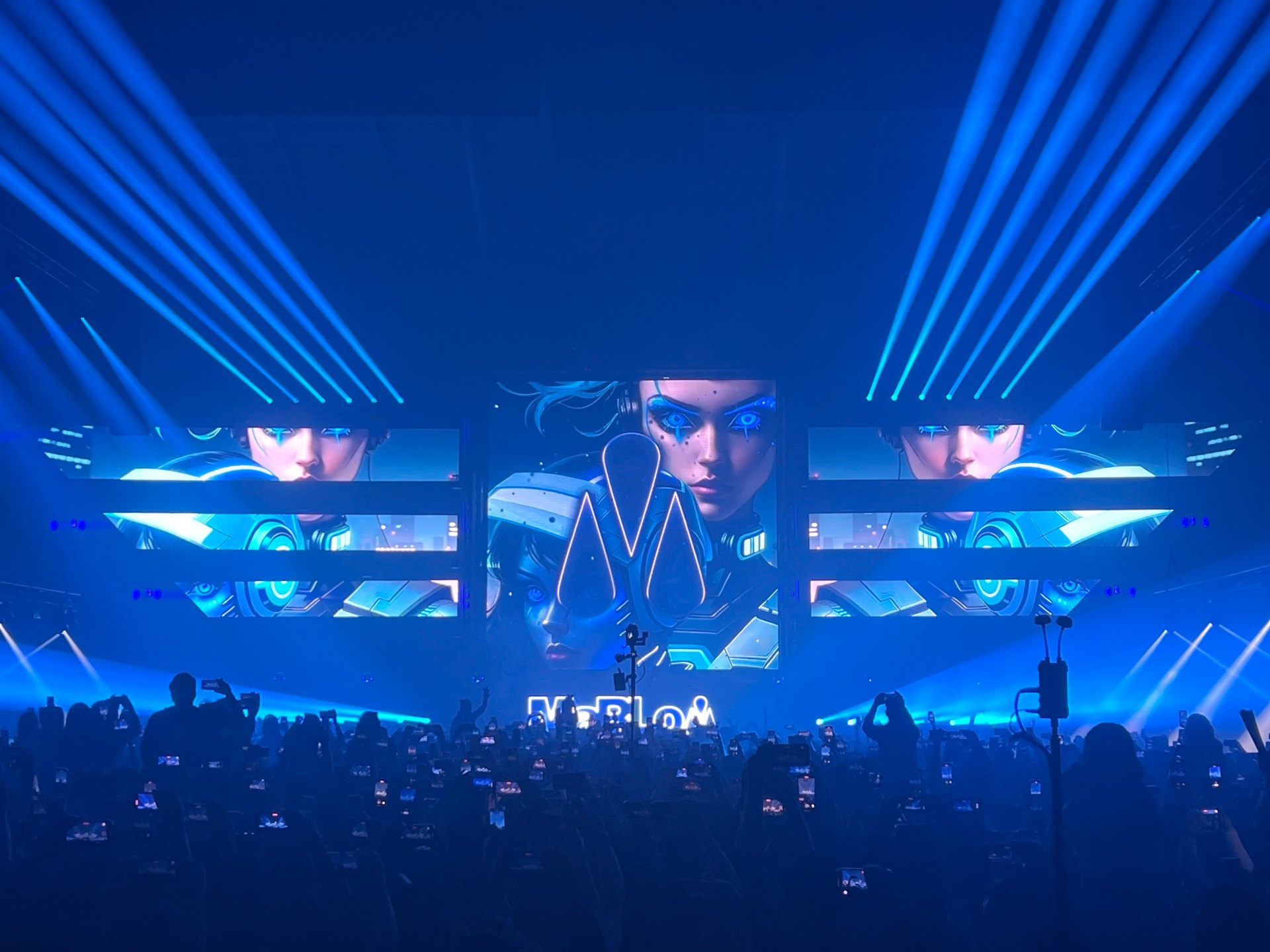A festival stage with a large hired LED screen