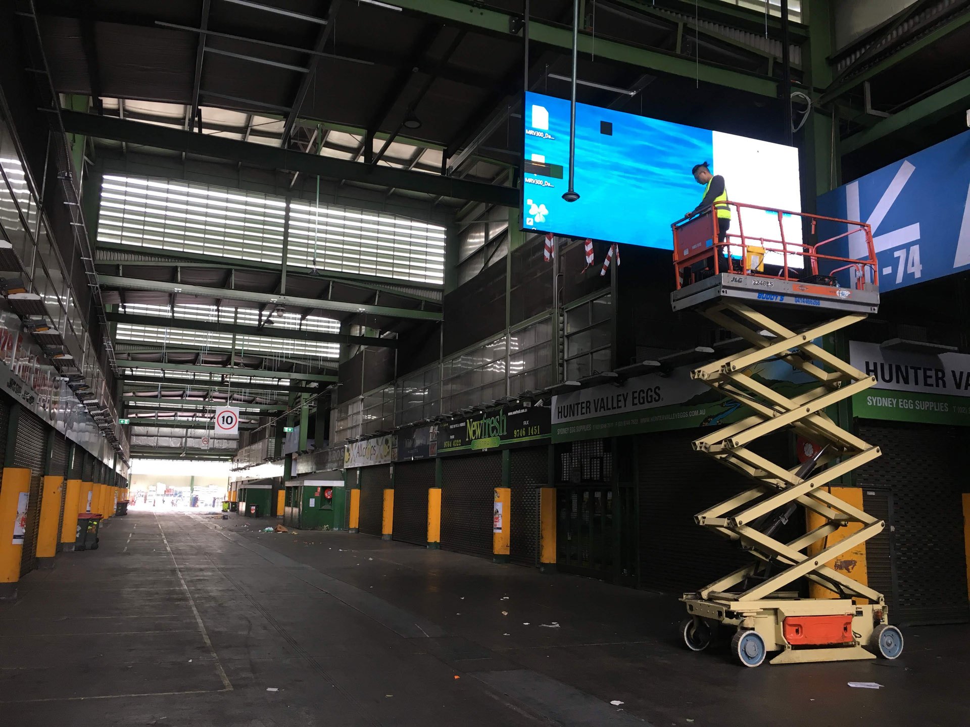 Constructing a large hanging LED video wall at Sydney Markets