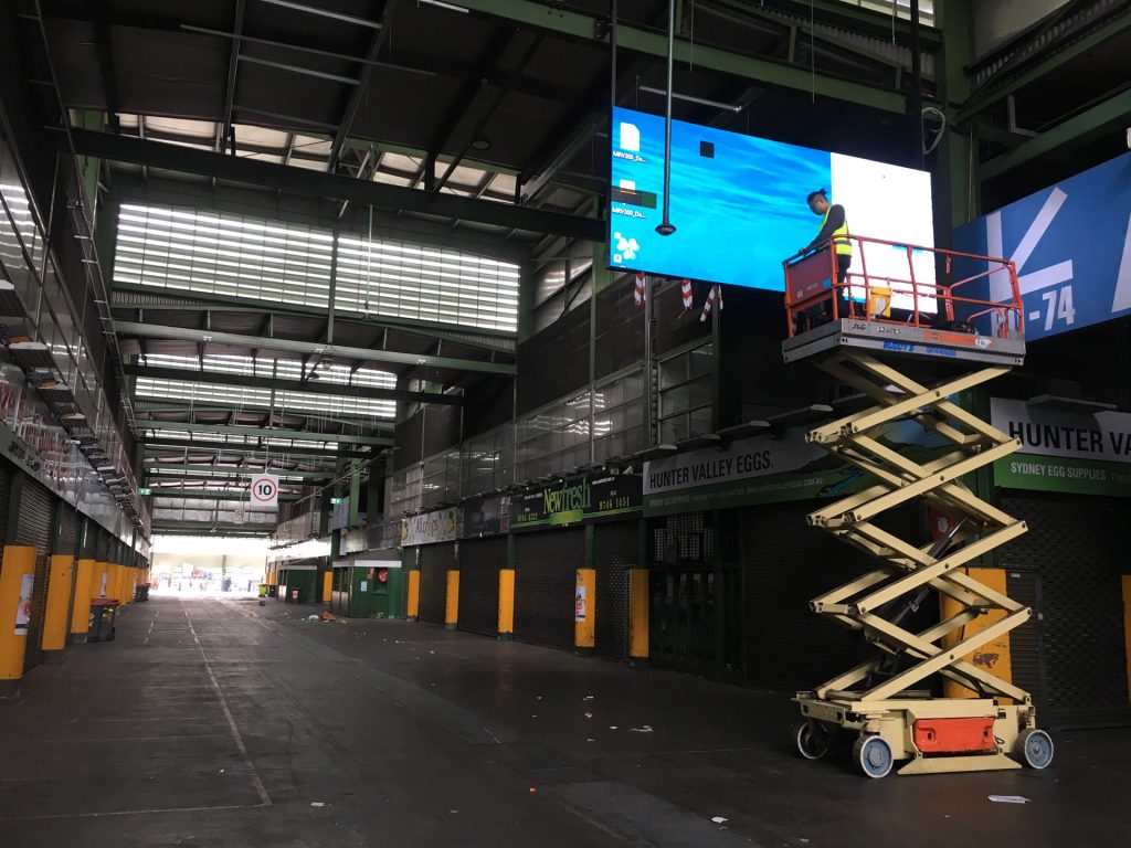 Constructing a large hanging LED video wall at Sydney Markets