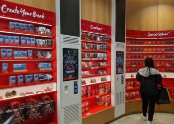 LED displays above Kiosks inside retail shop