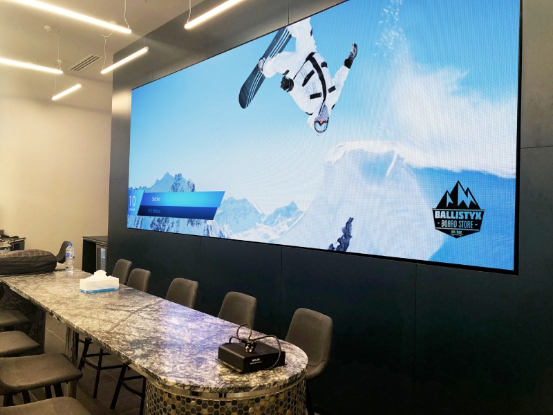 Large LED video wall display inside retail shop